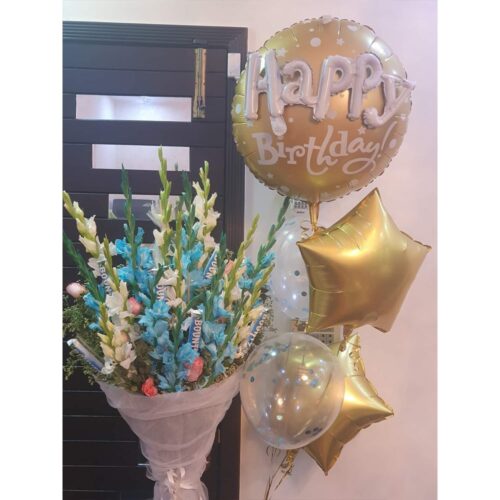 Flowers with chocolates, bouquet, and helium balloon bunch