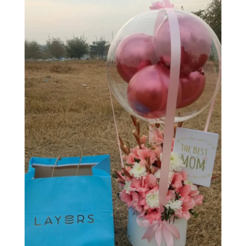 Balloon hamper having fresh imported flowers & layers Cake (Islamabad, Rawalpindi only)